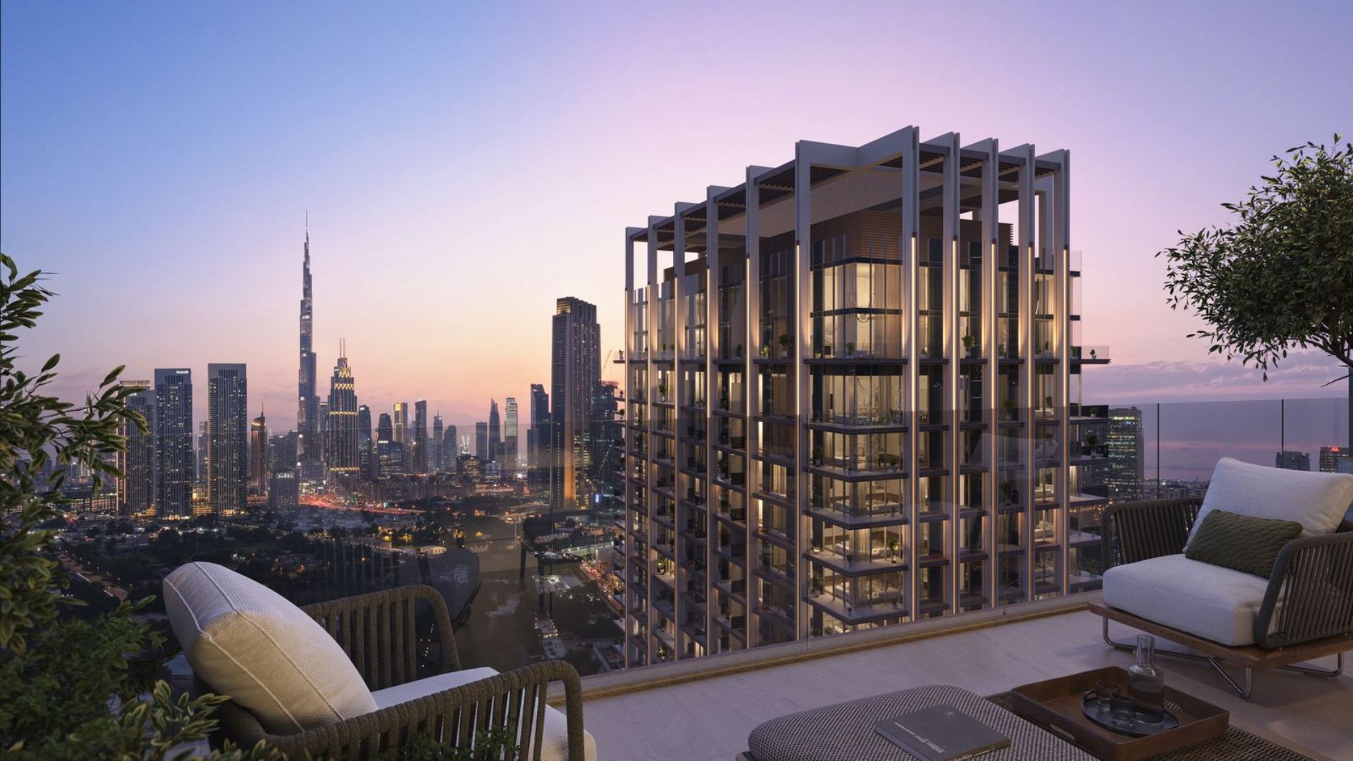 Terrace of a contemporary building in Dubai with a view of the Burj Khalifa and the skyline at dusk