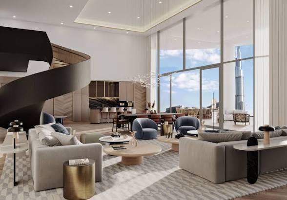 Salon double hauteur d'une villa Keturah Reserve avec vue sur Downtown Dubaï